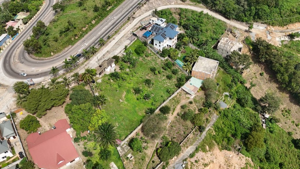 3 premium hilltop plots for sale in Peduase, Ghana, offering stunning Accra city and valley views. Ideal for luxury homes, boutique hotels, or retreats in a serene, upscale neighborhood with cool mountain breezes and fast development.